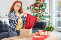woman opening xmas present